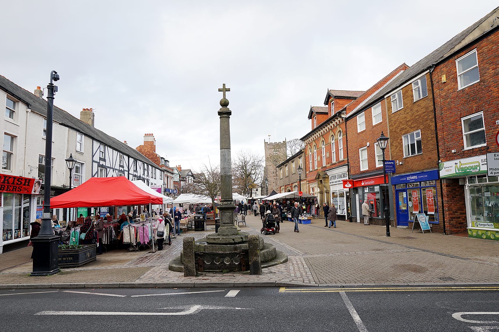 The highstreet of Poulton-Le-Fyde, this picture would have been taken before the Santander closure, as the bank is visible